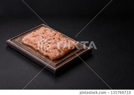 Raw ground chicken for burgers and other food. Raw minced chicken meat 135760718