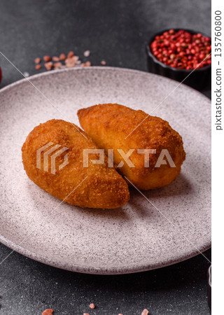 Chicken Kyiv cutlet with buttery filling, a lunch of chicken breast meat. Chicken Kyiv Chicken Kyiv cutlet with buttery filling, a lunch of chicken breast meat. Chicken Kyiv 135760800