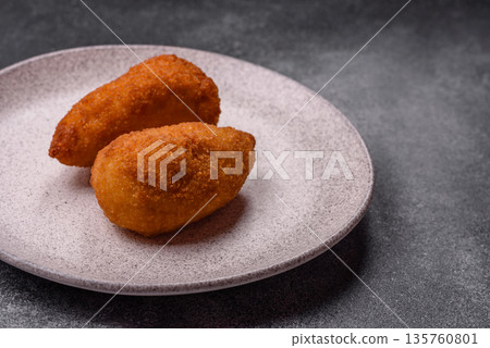 Chicken Kyiv cutlet with buttery filling, a lunch of chicken breast meat. Chicken Kyiv Chicken Kyiv cutlet with buttery filling, a lunch of chicken breast meat. Chicken Kyiv 135760801