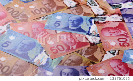 Money, currency of Canada, dollar banknotes of various denominations. Canadian money Money, currency of Canada, dollar banknotes of various denominations. Canadian money 135761055