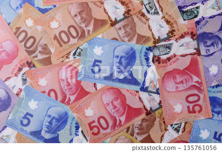 Money, currency of Canada, dollar banknotes of various denominations. Canadian money 135761056