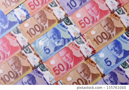 Money, currency of Canada, dollar banknotes of various denominations. Canadian money 135761088