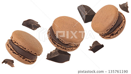 Chocolate macarons with dark chocolate pieces isolated on white background with clipping path, full depth of field Chocolate macarons with dark chocolate pieces isolated on white background with clipping path, full depth of field 135761190
