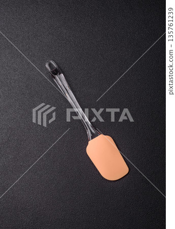 Spatula, silicone kitchen utensils for cooking and baking at home. Silicone spatula 135761239