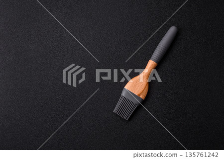 Brush, silicone kitchen utensils for cooking and baking at home. Silicone brush 135761242