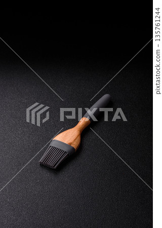 Brush, silicone kitchen utensils for cooking and baking at home. Silicone brush 135761244