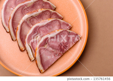 A meat roll made from pork or beef tongue slices with spices. Tongue roll A meat roll made from pork or beef tongue slices with spices. Tongue roll 135761456