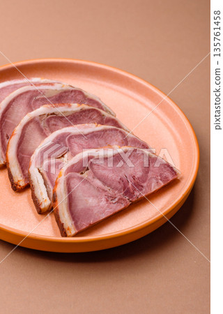 A meat roll made from pork or beef tongue slices with spices. Tongue roll A meat roll made from pork or beef tongue slices with spices. Tongue roll 135761458
