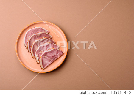 A meat roll made from pork or beef tongue slices with spices. Tongue roll A meat roll made from pork or beef tongue slices with spices. Tongue roll 135761460