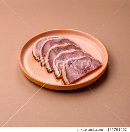 A meat roll made from pork or beef tongue slices with spices. Tongue roll A meat roll made from pork or beef tongue slices with spices. Tongue roll 135761462