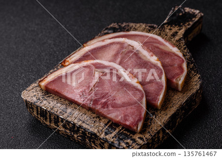 A meat roll made from pork or beef tongue slices with spices. Tongue roll A meat roll made from pork or beef tongue slices with spices. Tongue roll 135761467