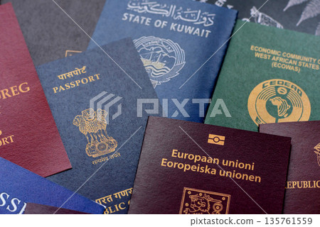 Passports of citizens of different countries of the world, passports background Passports of citizens of different countries of the world, passports background 135761559