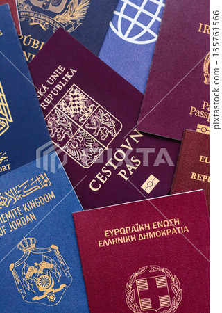 Passports of citizens of different countries of the world, passports background Passports of citizens of different countries of the world, passports background 135761566