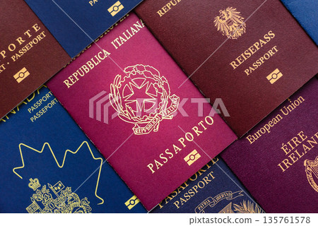 Passports of citizens of different countries of the world, passports background Passports of citizens of different countries of the world, passports background 135761578