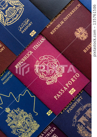 Passports of citizens of different countries of the world, passports background Passports of citizens of different countries of the world, passports background 135761586