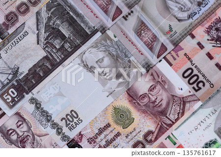 Money background, currency exchange, paper banknotes from different countries. Money cash currency Money background, currency exchange, paper banknotes from different countries. Money cash currency 135761617
