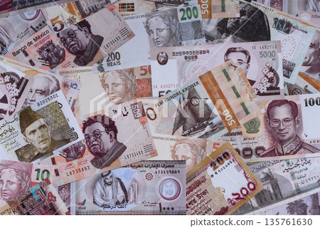 Money background, currency exchange, paper banknotes from different countries. Money cash currency Money background, currency exchange, paper banknotes from different countries. Money cash currency 135761630