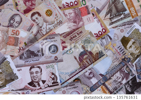 Money background, currency exchange, paper banknotes from different countries. Money cash currency Money background, currency exchange, paper banknotes from different countries. Money cash currency 135761631