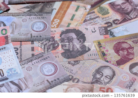 Money background, currency exchange, paper banknotes from different countries. Money cash currency 135761639