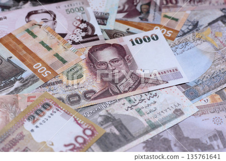 Money background, currency exchange, paper banknotes from different countries. Money cash currency Money background, currency exchange, paper banknotes from different countries. Money cash currency 135761641