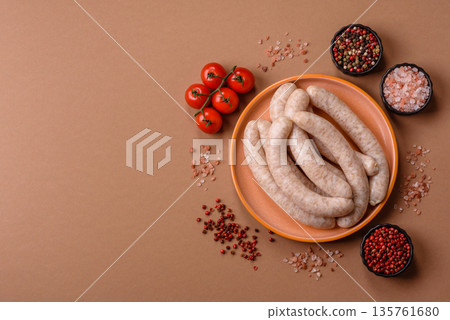 Raw pork or chicken meat sausages for grilling, a spicy picnic food. Raw sausages Raw pork or chicken meat sausages for grilling, a spicy picnic food. Raw sausages 135761680