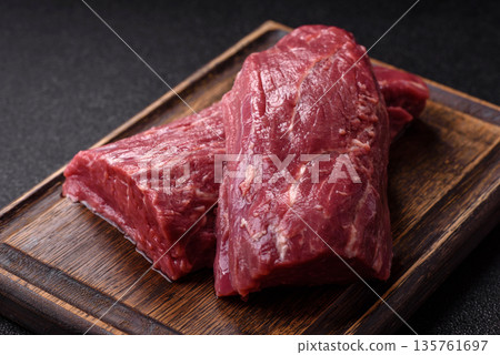 Raw meat, fresh beef tenderloin or filet mignon for grilling. Raw beef tenderloin Raw meat, fresh beef tenderloin or filet mignon for grilling. Raw beef tenderloin 135761697