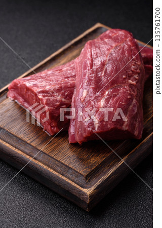 Raw meat, fresh beef tenderloin or filet mignon for grilling. Raw beef tenderloin 135761700
