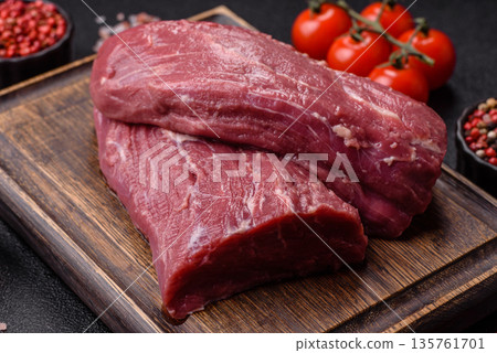 Raw meat, fresh beef tenderloin or filet mignon for grilling. Raw beef tenderloin Raw meat, fresh beef tenderloin or filet mignon for grilling. Raw beef tenderloin 135761701