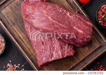 Raw meat, fresh beef tenderloin or filet mignon for grilling. Raw beef tenderloin Raw meat, fresh beef tenderloin or filet mignon for grilling. Raw beef tenderloin 135761702