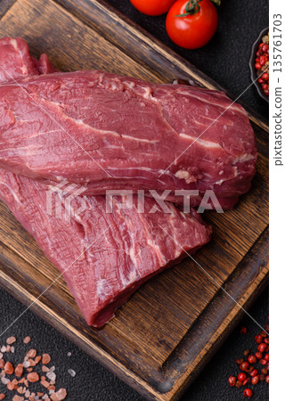 Raw meat, fresh beef tenderloin or filet mignon for grilling. Raw beef tenderloin Raw meat, fresh beef tenderloin or filet mignon for grilling. Raw beef tenderloin 135761703