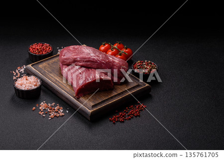 Raw meat, fresh beef tenderloin or filet mignon for grilling. Raw beef tenderloin Raw meat, fresh beef tenderloin or filet mignon for grilling. Raw beef tenderloin 135761705