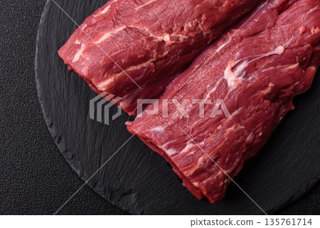Raw meat, fresh beef tenderloin or filet mignon for grilling. Raw beef tenderloin Raw meat, fresh beef tenderloin or filet mignon for grilling. Raw beef tenderloin 135761714