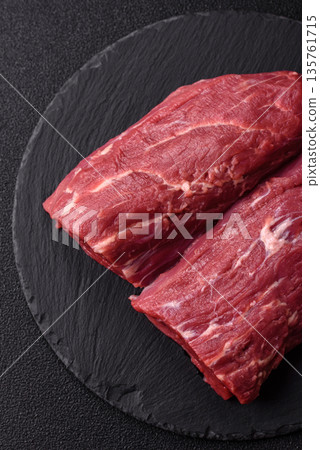Raw meat, fresh beef tenderloin or filet mignon for grilling. Raw beef tenderloin Raw meat, fresh beef tenderloin or filet mignon for grilling. Raw beef tenderloin 135761715