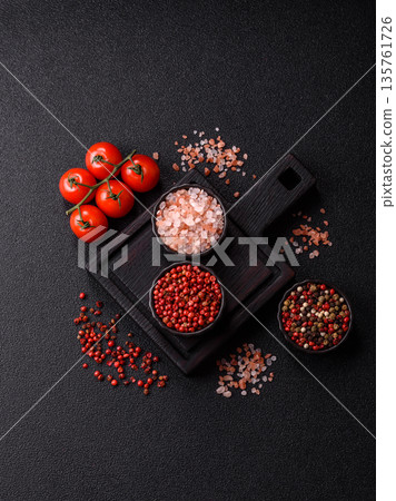 Indian spices, pepper, salt, turmeric, ingredients for cooking. Spices pepper, salt, and turmeric Indian spices, pepper, salt, turmeric, ingredients for cooking. Spices pepper, salt, and turmeric 135761726
