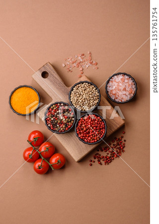 Indian spices, pepper, salt, turmeric, ingredients for cooking. Spices pepper, salt, and turmeric Indian spices, pepper, salt, turmeric, ingredients for cooking. Spices pepper, salt, and turmeric 135761754