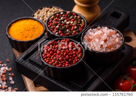 Indian spices, pepper, salt, turmeric, ingredients for cooking. Spices pepper, salt, and turmeric 135761760