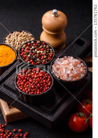 Indian spices, pepper, salt, turmeric, ingredients for cooking. Spices pepper, salt, and turmeric Indian spices, pepper, salt, turmeric, ingredients for cooking. Spices pepper, salt, and turmeric 135761762