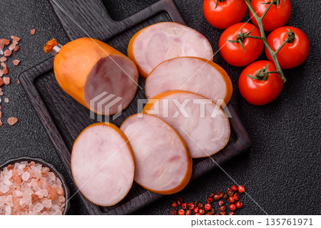 Ham, cooked sausage slices for breakfast sandwiches. Sliced boiled sausage Ham, cooked sausage slices for breakfast sandwiches. Sliced boiled sausage 135761971