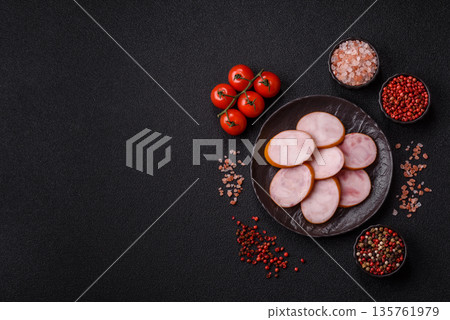 Ham, cooked sausage slices for breakfast sandwiches. Sliced boiled sausage Ham, cooked sausage slices for breakfast sandwiches. Sliced boiled sausage 135761979