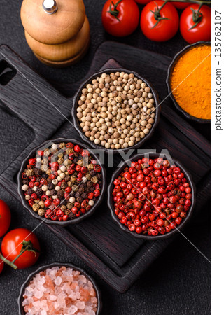 Indian spices, pepper, salt, turmeric, ingredients for cooking. Spices pepper, salt, and turmeric 135762107