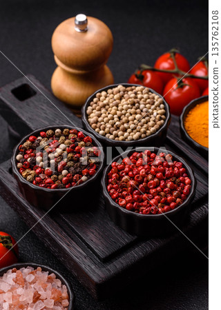 Indian spices, pepper, salt, turmeric, ingredients for cooking. Spices pepper, salt, and turmeric 135762108