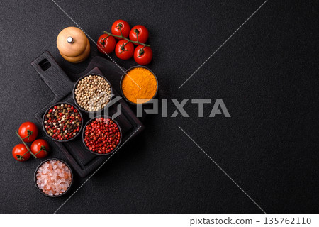 Indian spices, pepper, salt, turmeric, ingredients for cooking. Spices pepper, salt, and turmeric 135762110