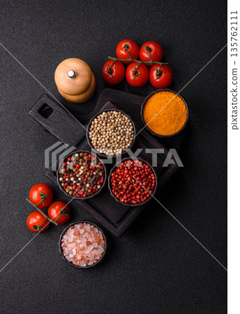 Indian spices, pepper, salt, turmeric, ingredients for cooking. Spices pepper, salt, and turmeric 135762111