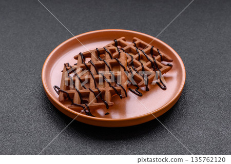 Belgian waffles, a healthy sweet breakfast dessert, food background. Belgian waffles Belgian waffles, a healthy sweet breakfast dessert, food background. Belgian waffles 135762120