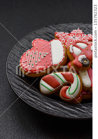 Gingerbread, Christmas cookies, and ornamental holiday baked goods. Christmas gingerbread Gingerbread, Christmas cookies, and ornamental holiday baked goods. Christmas gingerbread 135762323