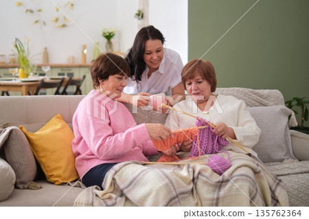 importance of female bonding in families. Enduring Art of Knitting: The age-old craft of knitting bridges the age gap between the young and the old. importance of female bonding in families. Enduring Art of Knitting: The age-old craft of knitting bridges the age gap between the young and the old. 135762364