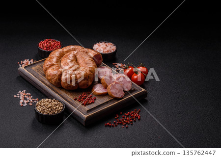 Grilled sausage in the shape of a spiral or snail, from chicken or pork. Spiral or snail sausage Grilled sausage in the shape of a spiral or snail, from chicken or pork. Spiral or snail sausage 135762447