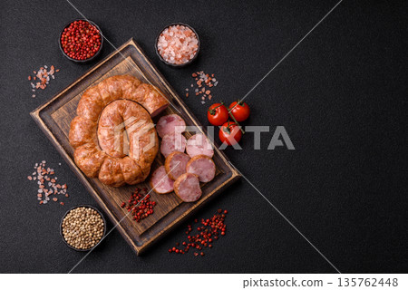 Grilled sausage in the shape of a spiral or snail, from chicken or pork. Spiral or snail sausage Grilled sausage in the shape of a spiral or snail, from chicken or pork. Spiral or snail sausage 135762448