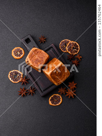 A French cube croissant with chocolate filling, a sweet breakfast pastry. Cube croissant A French cube croissant with chocolate filling, a sweet breakfast pastry. Cube croissant 135762464
