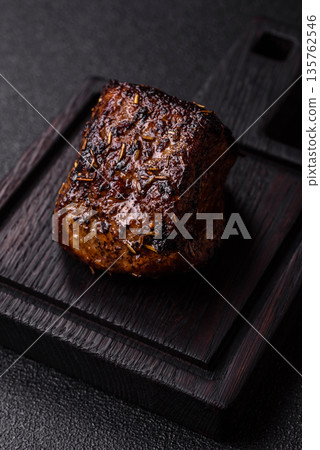 Grilled or barbecued beef steak, a fillet of meat cooked for dinner. Beef steak Grilled or barbecued beef steak, a fillet of meat cooked for dinner. Beef steak 135762546
